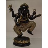 A bronze figure of an Indian God, bronze and gilt