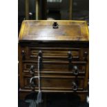20th Century miniature apprentice style bureau desk with fall revealing fitted interior and three