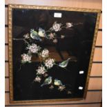 A painting on black velvet of blue tits on apple blossom, circa 1920/30's