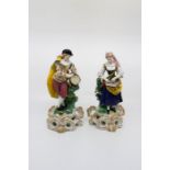 A pair of Samson of Paris porcelain figures as musicians standing on gilt scrolled bases. Date c.
