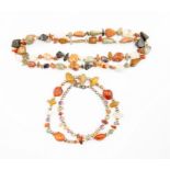 Two contemporary multigem set single strand bead necklaces, each set with various semi-precious