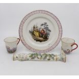 A group of Continental porcelain pieces including a dish, three cups and saucer (Q)