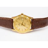 An Omega Seamaster gold plated gents watch, gold tone dial, batons,  with date window, quartz