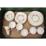 A Royal Stafford Art Deco tea ware collection to comprise; five cups and six saucers, milk jug,