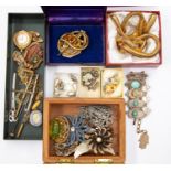 A collection of costume jewellery to include a Victorian pinchbeck brooch set foliate decoration set