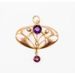 An Art Nouveau 9ct rose gold pendant, open decoration set with round amethysts and seed pearl