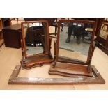 Two Victorian mahogany toilet mirrors along with late Victorian copper fender