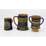 Collection of Royal Doulton Lambeth Pottery including filter christening mug and ale mug