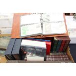 A collection of stamps comprising; ten albums of used worldwide mid 20th Century stamps, nine albums