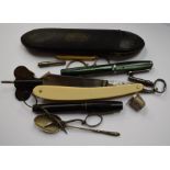Assorted early 20th Century items including eye glasses, gilt fob, razor and pens