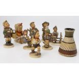 Collection of mid 20th Century Hummel figurines of boy and girls, along with a West German small