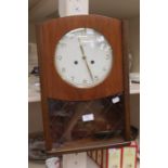 A 1930's wall clock, hourly strike and 1/2 hour