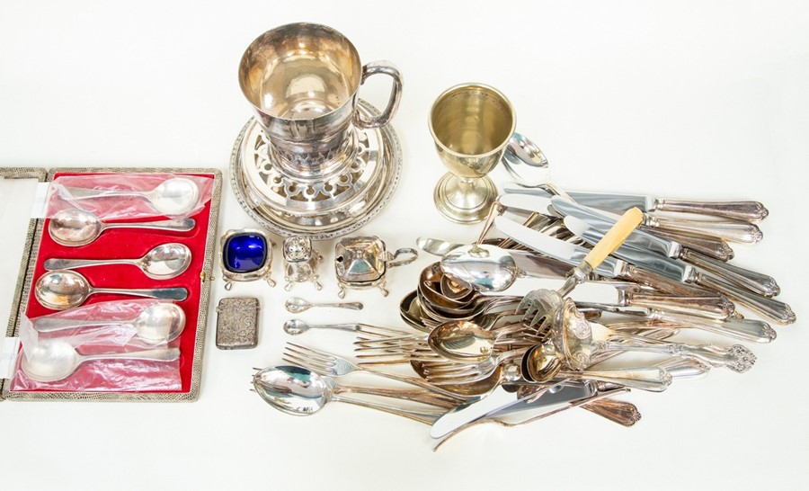 A collection of items to include a silver vesta case along with EPNS cutlery and assorted plated