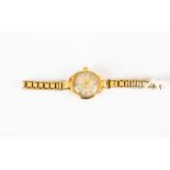 An Omega ladies 9ct gold cased bracelet watch, circa 1940's, round dial,  with later rolled gold