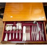 A 1960's canteen of cutlery, stainless steel, the canteen is on legs with three drawers