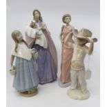 Four large Nao figures; two of ladies and a boy and girl