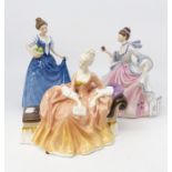 Three Royal Doulton late 20th Century lady figurines; Reverie HN2306; Rebecca HN2805 and Helen
