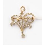 An Edwardian diamond and  pearl pendant brooch,  scroll and foliate details set with old cut