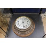 An aneroid wall barometer