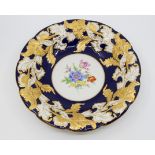 Meissen gilded and floral ornamental cabinet bowl with blue background gold and white relief leaf