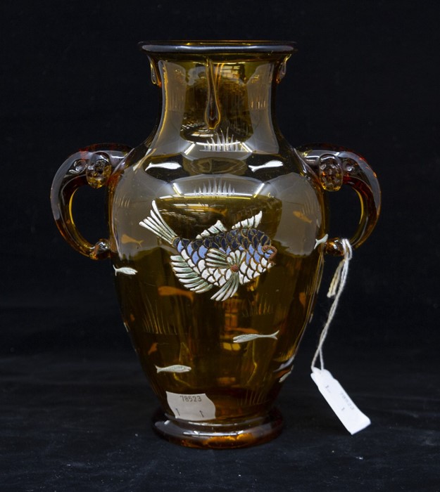 A late 19th Century amber glass twin handled vase in the style of Moser, enamelled fish