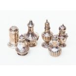 Six various silver pepper pots, one hallmarked  Chester 1895, other Birmingham examples, weight