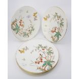 A set of four Victorian Aesthetic dessert plates, each outline transfer printed and hand painted