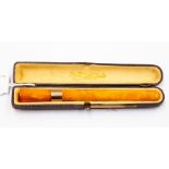 A 1920's Phenolic Sharoot holder with a yellow metal band complete with case.