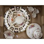 A pair of Royal Crown Derby 1128 Imari dinner plates and a pair of 2451 inch dinner plates, Derby