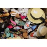 A collection of miniature ladies accessories including shoes, hats and bags, various styles and