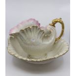 A large Continental pitcher and bowl in the form of shells - lustre background and gilt handle