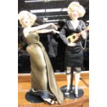 Two Franklin Mint porcelain Marilyn Monroe dolls to include Some Like it Hot, approx 50 cms high,