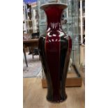 A large floor standing vase