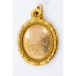 A 15ct gold medallion, the oval medallion presented by James Coates Esq providence Rhode Island to