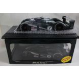 A pair of Auto Art Bentley Le Mans racing cars, number 8 boxed, number 7 in perspex display case (
