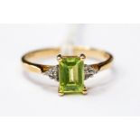 A 9ct peridot and diamond ring