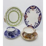 A collection of Royal Crown Derby plates, cups, cream jug, trios and others from 1879 to the present