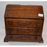 A mid 20th Century chest of drawers / bureau, maybe WWII era