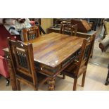 An Early 20th Century Oak Dining Table and Set of Four chairs