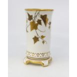 A china spill vase with applied gilt ivy leaves and butterflies, hairline to base