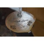 An oyster dish with hand painted Japanese decoration, white metal applied Japanese script and