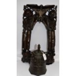 Temple bell with decorated studs, dragons and carved hardwood hanging frame with two figures in