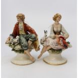 Pair of modern Capodimonte figures of boy and girl lovers