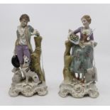 A pair of 20th Century Dresden figures of shepherd and shepherdess, porcelain figures