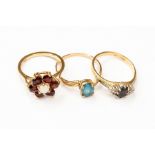 Three 9ct gold dress rings to include a sapphire ring size M1/2 along with a garnet and opal