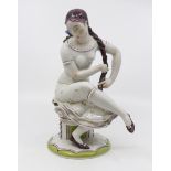 P.M and M German statue of a lady with platted hair seated on stool, impressed back stamp, 28 cms