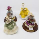 Two Royal Doulton late 20th Century lady figurines (one damaged) and two Fruit Children figurines by