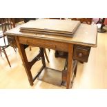 A 1930's Jone's oak sewing machine workstation, good working order