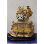 A late 19th Century French gilt metal and onyx bracket clock, surmounted with Louis XVI figure in