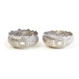 Two early 20th century Indian silver bon bon dishes, both pieces having floral and foilage